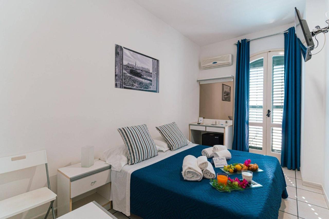 Hotel Le Dune Сампиери Экстерьер фото